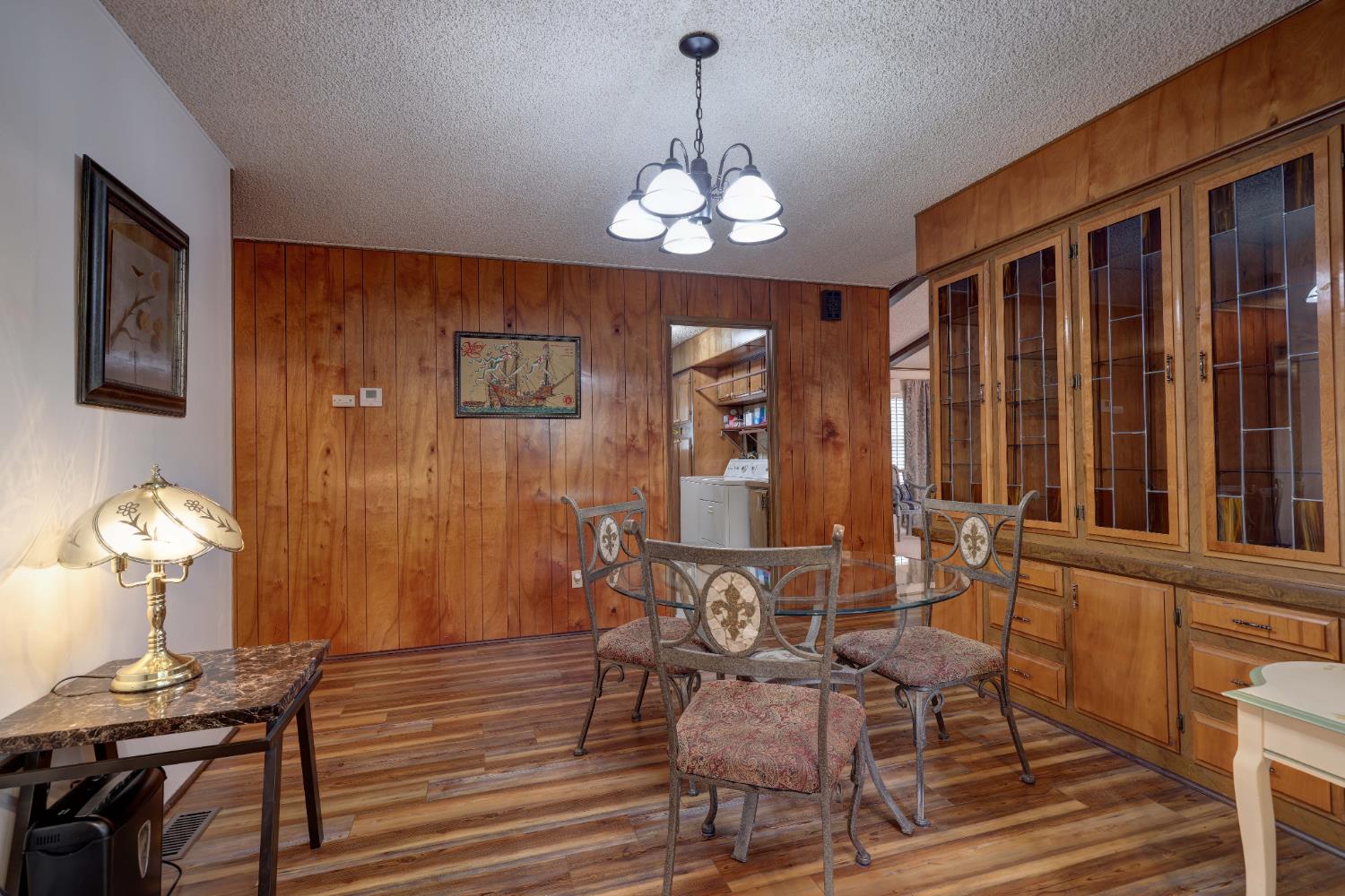 3765 Grass Valley Highway, Unit 263 Auburn, CA 95602 - Photo 20 of 38 a view of a dining room with furniture window and wooden floor