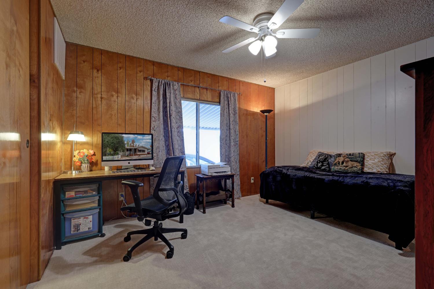 3765 Grass Valley Highway, Unit 263 Auburn, CA 95602 - Photo 25 of 38 a view of a workspace with furniture and a window