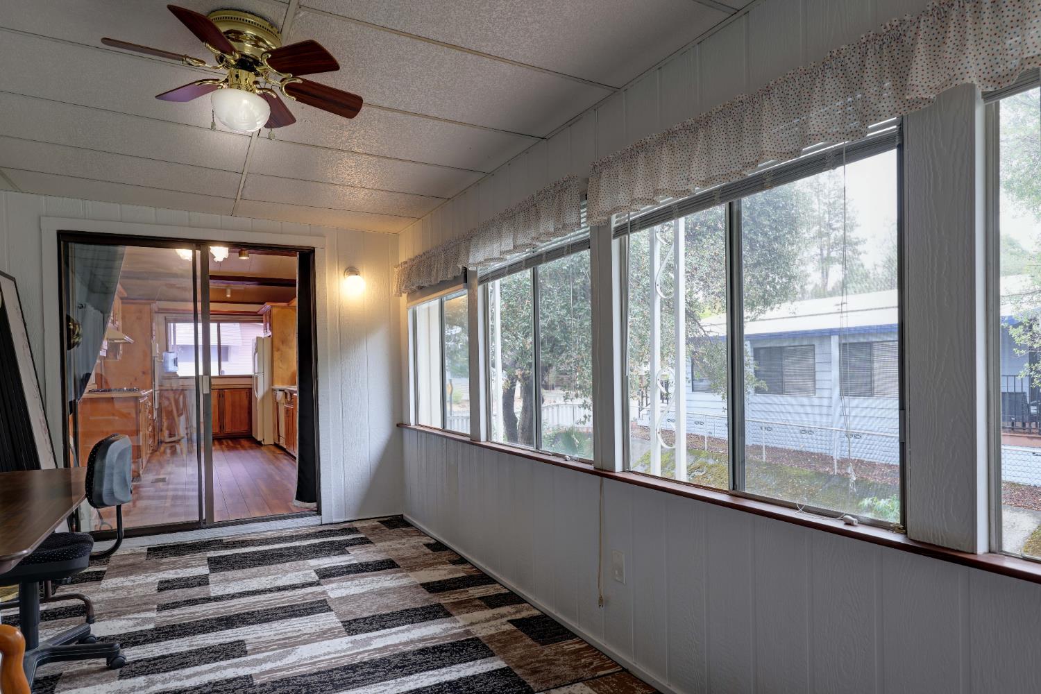 3765 Grass Valley Highway, Unit 263 Auburn, CA 95602 - Photo 28 of 38 a view of a room with wooden floor and windows