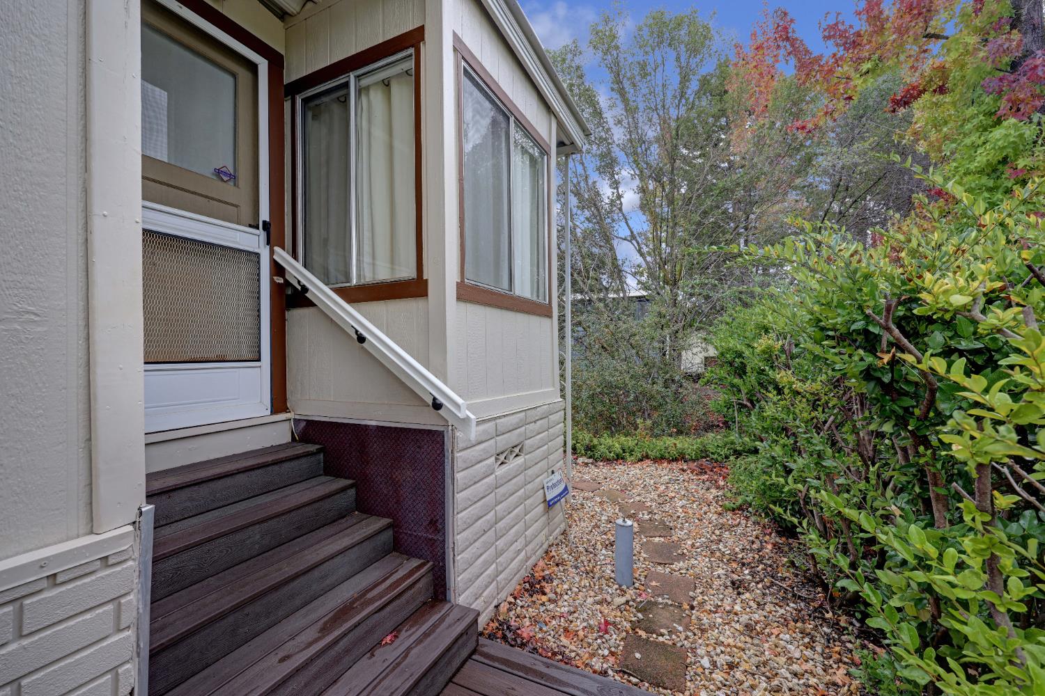 3765 Grass Valley Highway, Unit 263 Auburn, CA 95602 - Photo 31 of 38 a view of a house with a trees