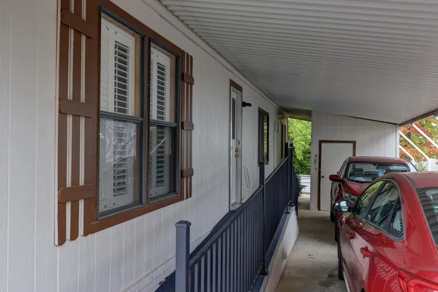 a view of a tree front of house