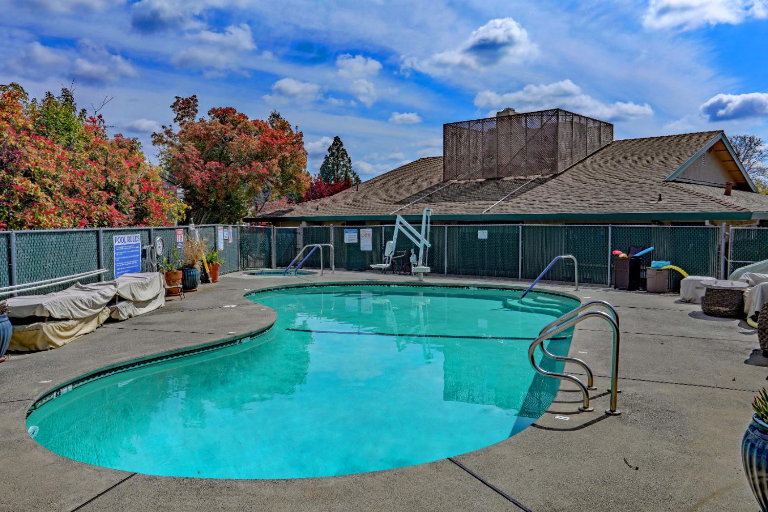 3765 Grass Valley Highway, Unit 263 Auburn, CA 95602 - Photo 35 of 38 swimming pool view with a seating space and a garden view