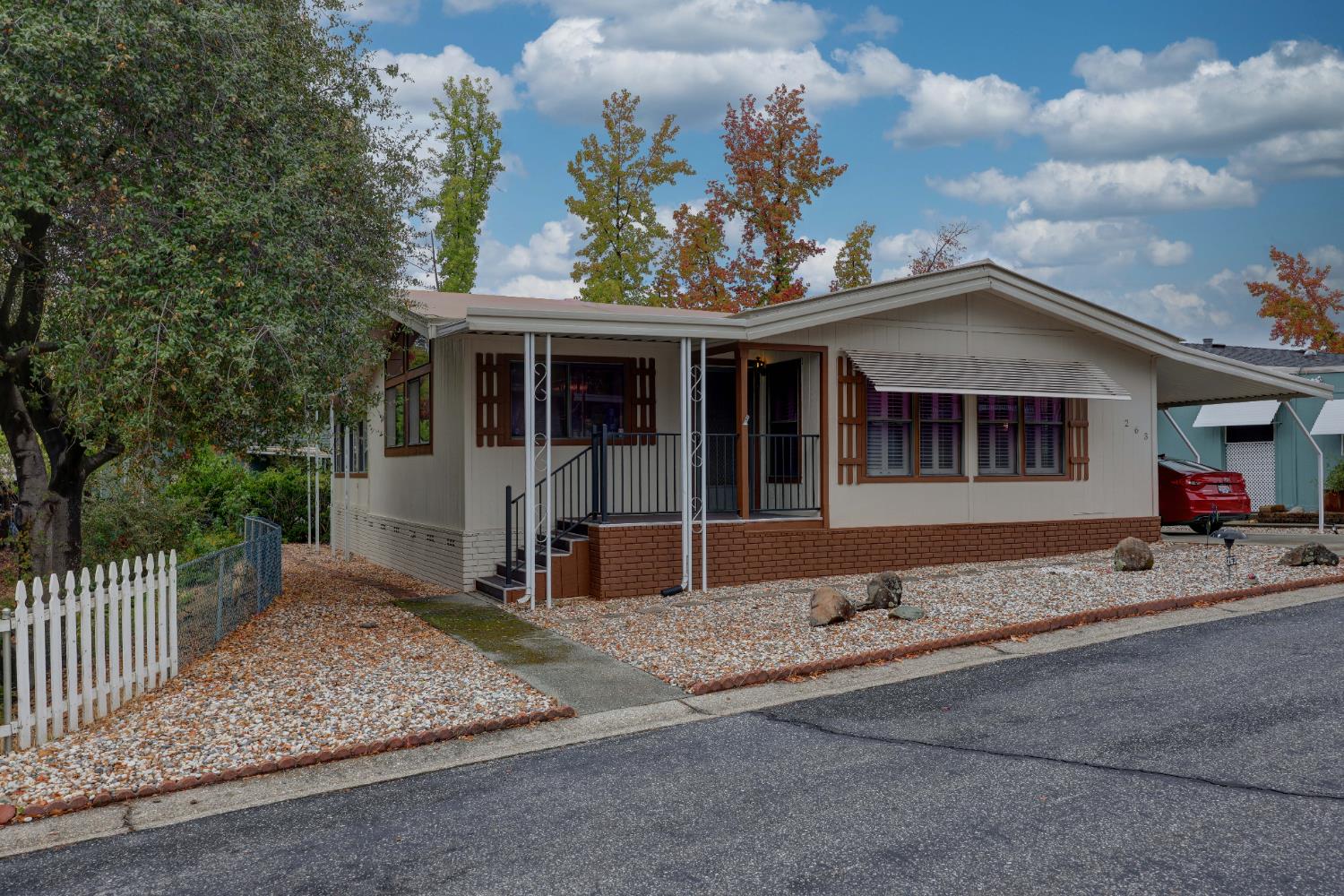 3765 Grass Valley Highway, Unit 263 Auburn, CA 95602 - Photo 5 of 38 a front view of a house with a porch