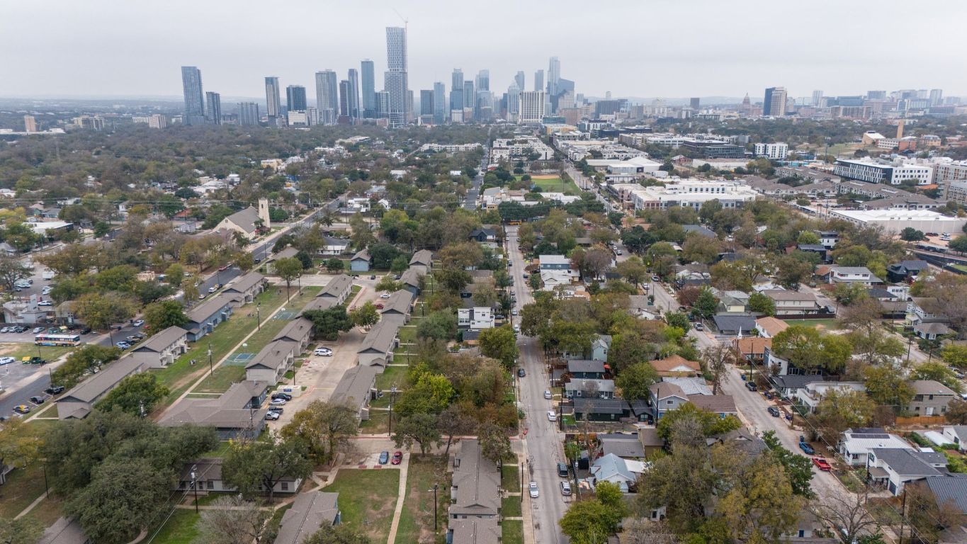 2404 Santa Rita Street Austin, TX 78702 - Photo 26 of 27 Aerial view of property and surrounding area featuring city skyline