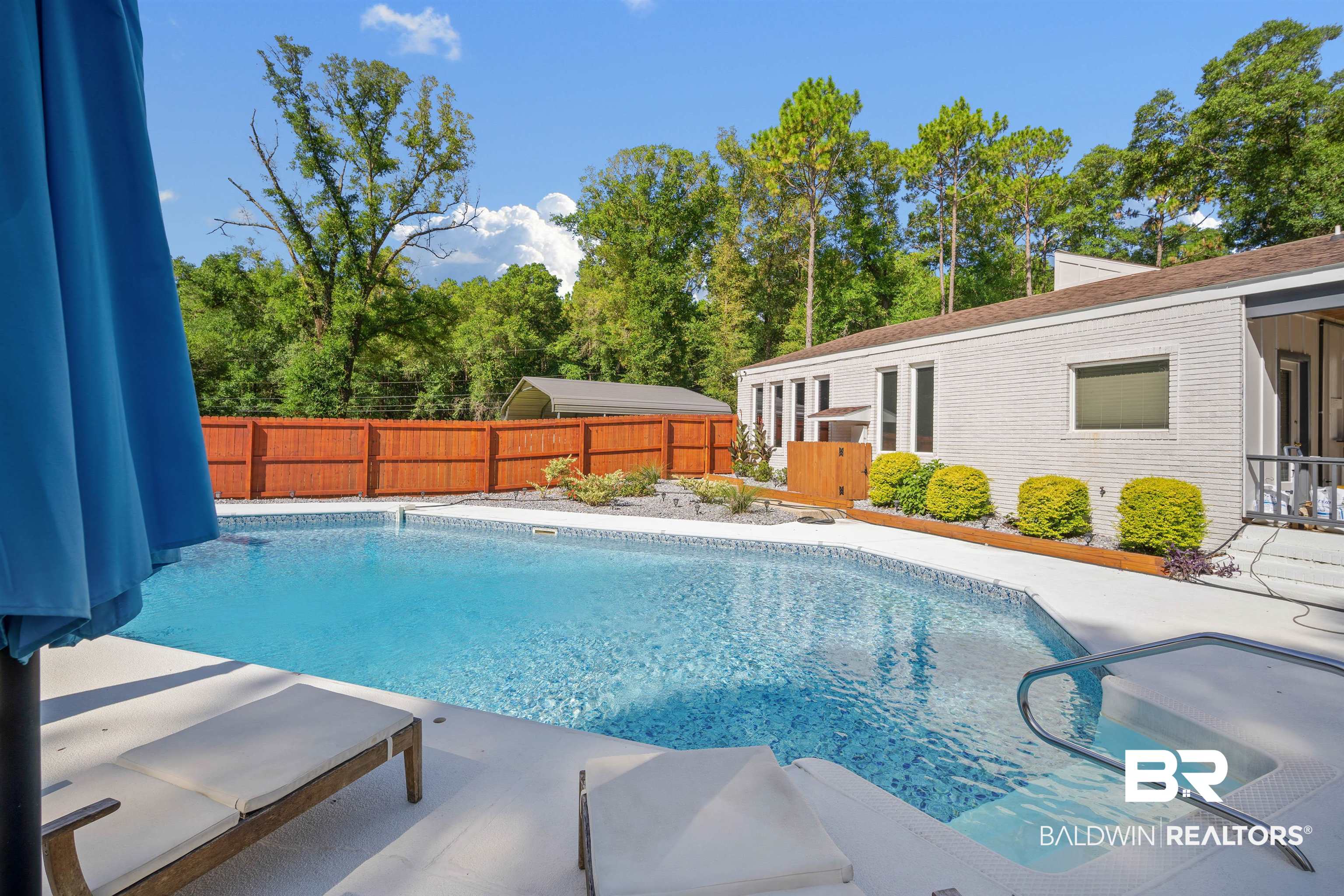 7912 Yorkhaven Road Mobile, AL 36695 - Photo 30 of 41 View of swimming pool with a fenced backyard and a patio