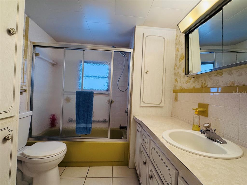 2331 Belleair Road, Unit 715 Clearwater, FL 33764 - Photo 19 of 43 a bathroom with a sink toilet and shower