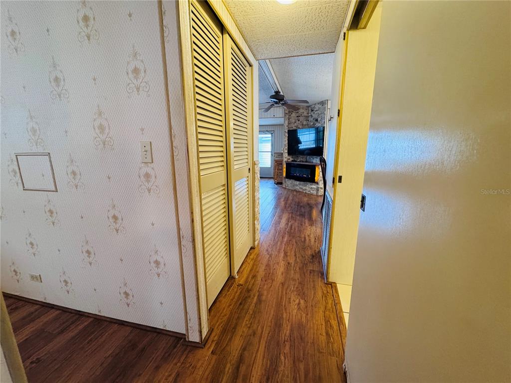 2331 Belleair Road, Unit 715 Clearwater, FL 33764 - Photo 26 of 43 a view of a hallway with wooden floor