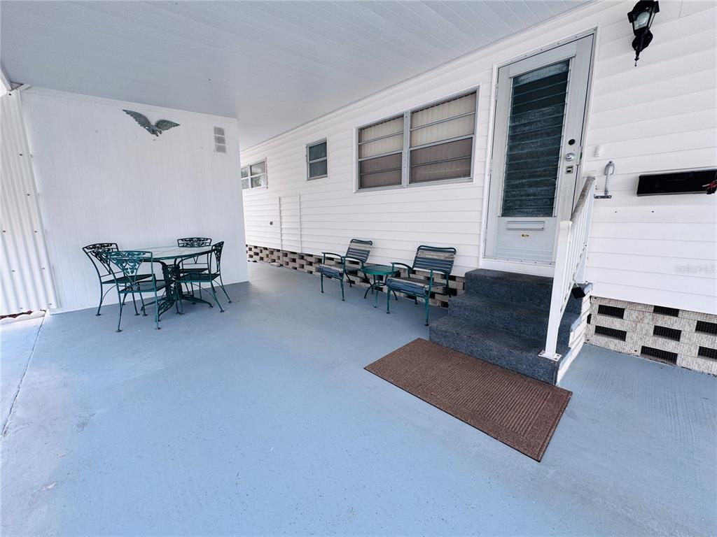 2331 Belleair Road, Unit 715 Clearwater, FL 33764 - Photo 31 of 43 a living room with furniture pool table and chairs