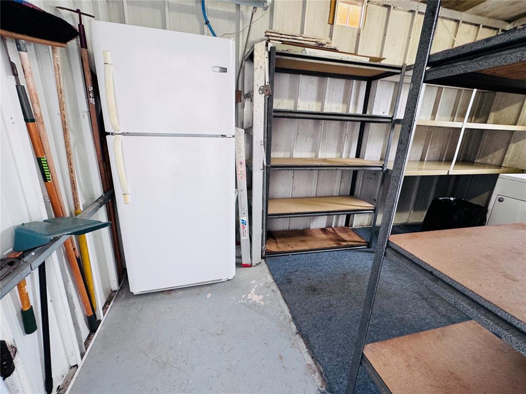2331 Belleair Road, Unit 715 Clearwater, FL 33764 - Photo 35 of 43 a view of walk in closet with empty racks