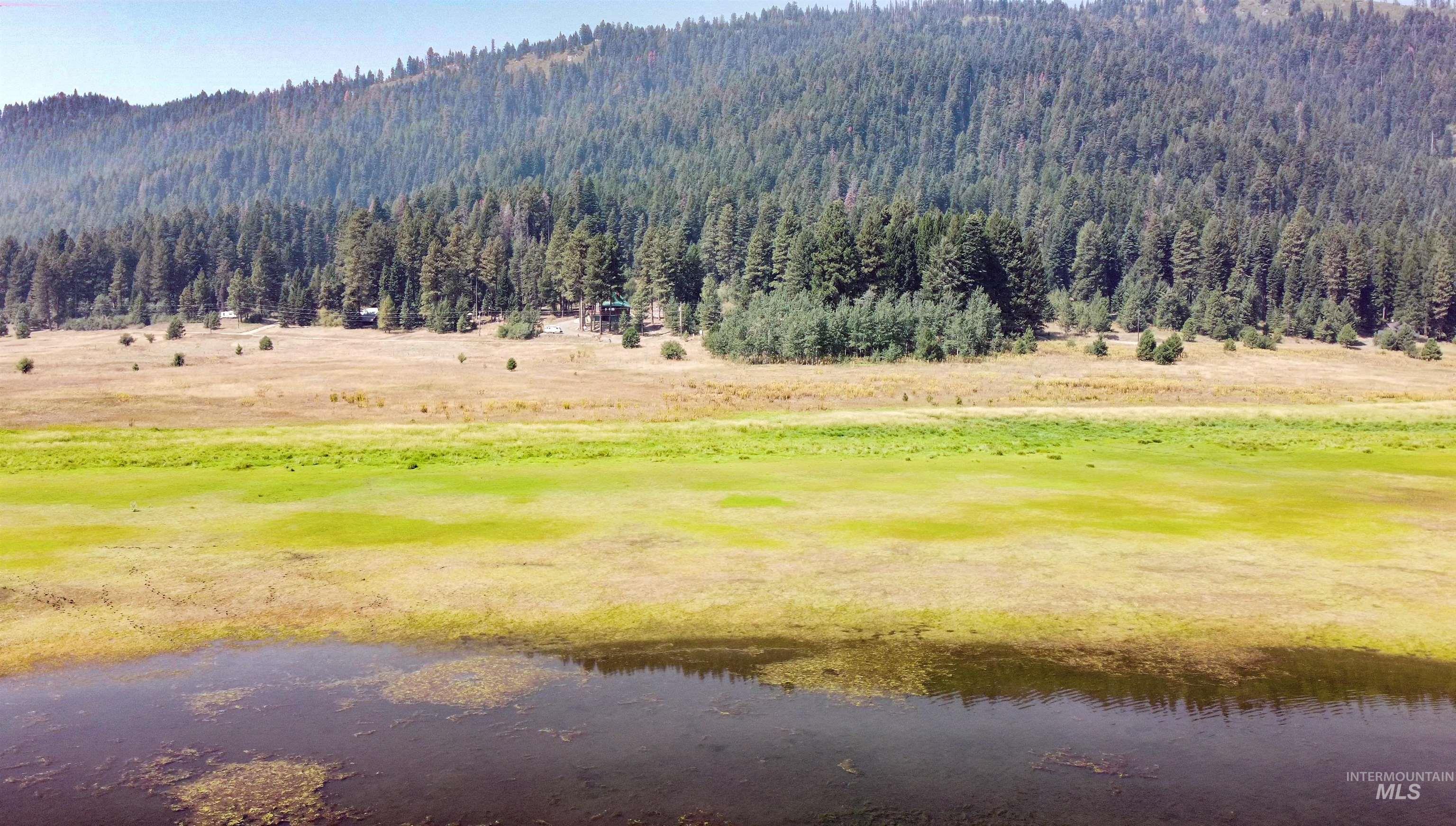 1539 West Mountain Road Cascade, ID 83611 - Photo 30 of 33 Mountain view featuring a nearby body of water and a local golf course