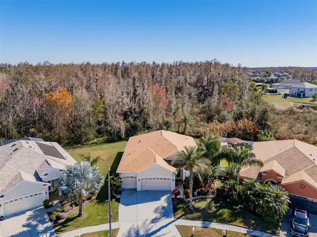 an aerial view of a house with a garden
