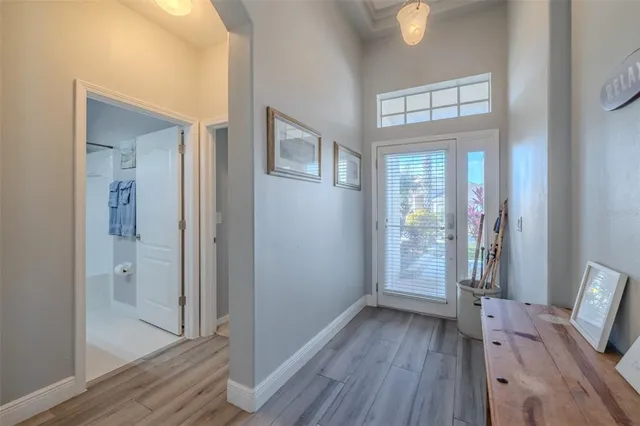 a view of livingroom with hardwood floor and hallway