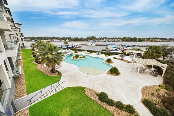 $1,100,000 | 199 Waterpoint Court, Unit 214, Conroe, TX 77356
