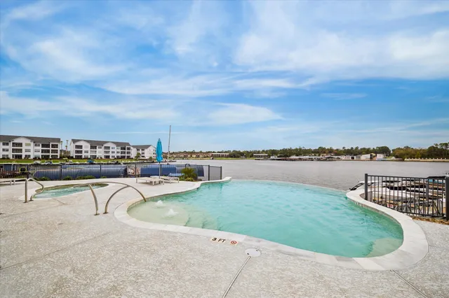 $1,100,000 | 199 Waterpoint Court, Unit 214, Conroe, TX 77304