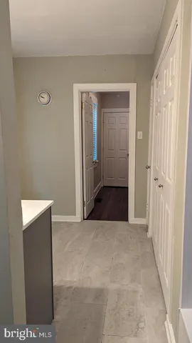 a view of hallway with closet