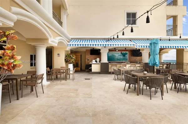 a view of a tables and chairs in patio