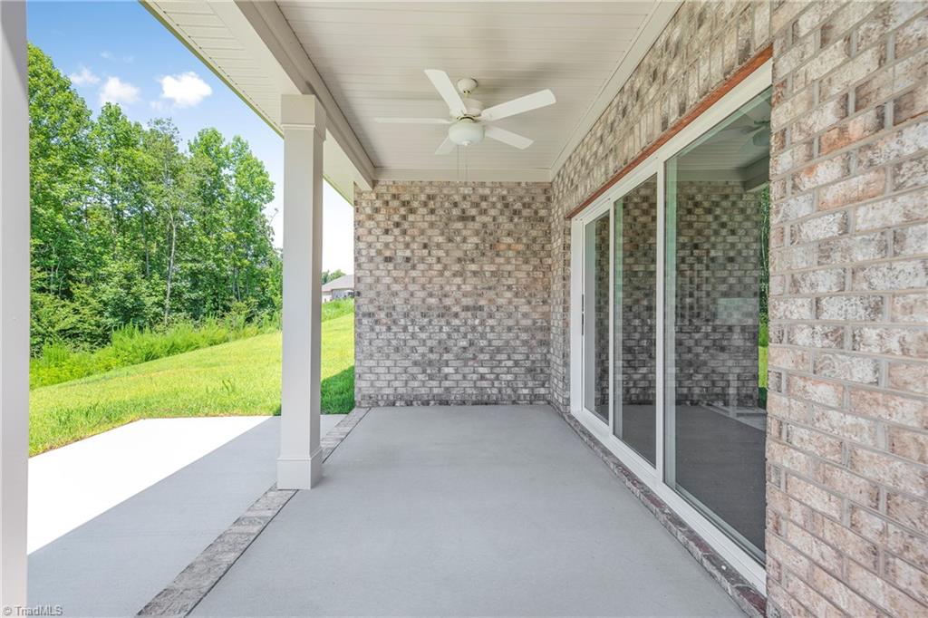 2048 Welden Ridge Road Kernersville, NC 27284 - Photo 42 of 50 Covered Back Porch overlooking treeline