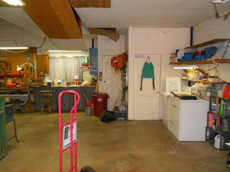 5001 Takilma Road Cave Junction, OR 97523 - Photo 24 of 27 Inside shop / garage. Also laundry area
