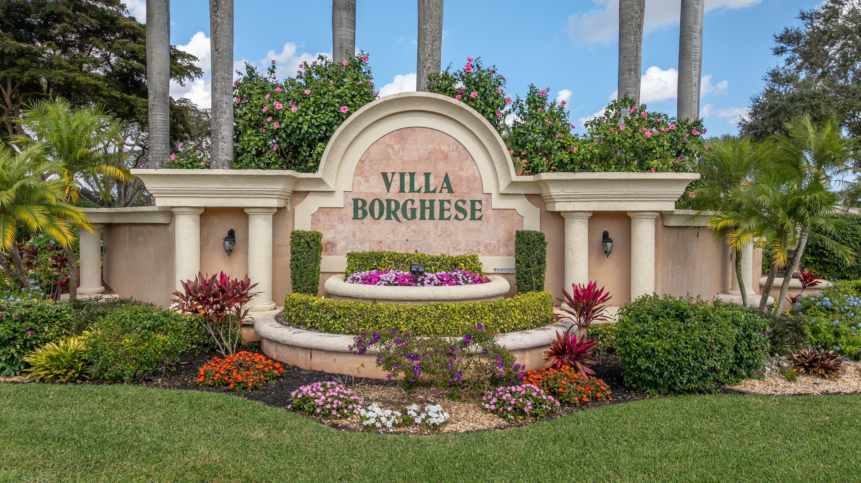 6698 Vía Roma Delray Beach, FL 33446 - Photo 27 of 50 a front view of multi story residential apartment building with yard