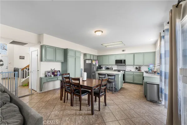 a view of a dining room kitchen and a window