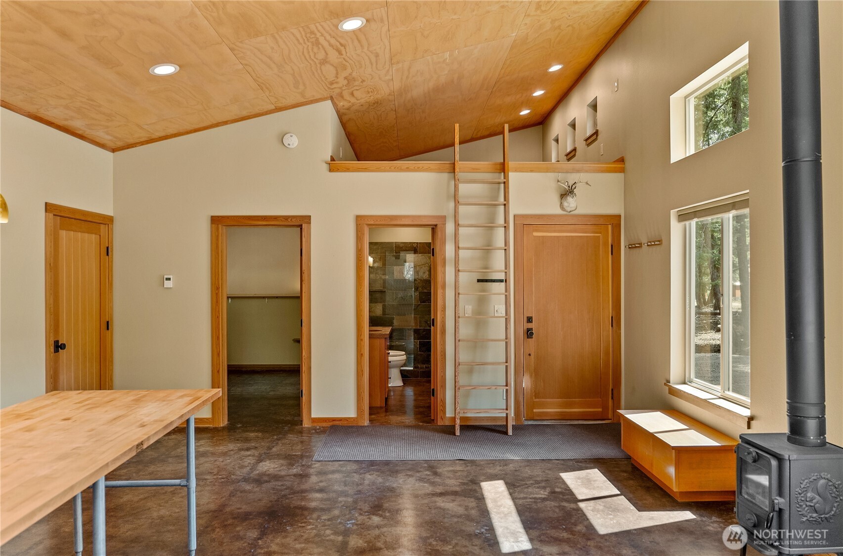 16 Littell Road Mazama, WA 98833 - Photo 30 of 40 a view of a hallway with furniture and a bathroom