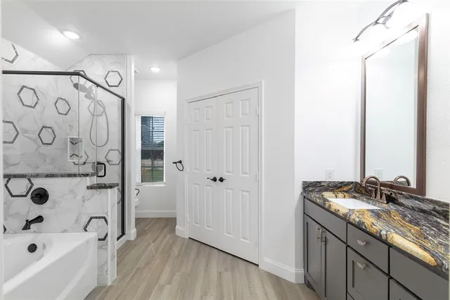 a bathroom with a sink and a tub