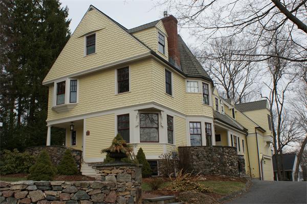 112 Crest Road Wellesley, MA 02482 - Photo 1 of 1 a front view of a house with plants