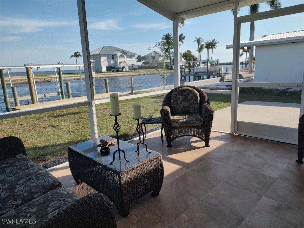 2585 Third Street Matlacha, FL 33993 - Photo 15 of 16 a living room filled with furniture