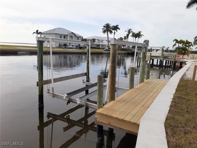 a view of a balcony with chairs