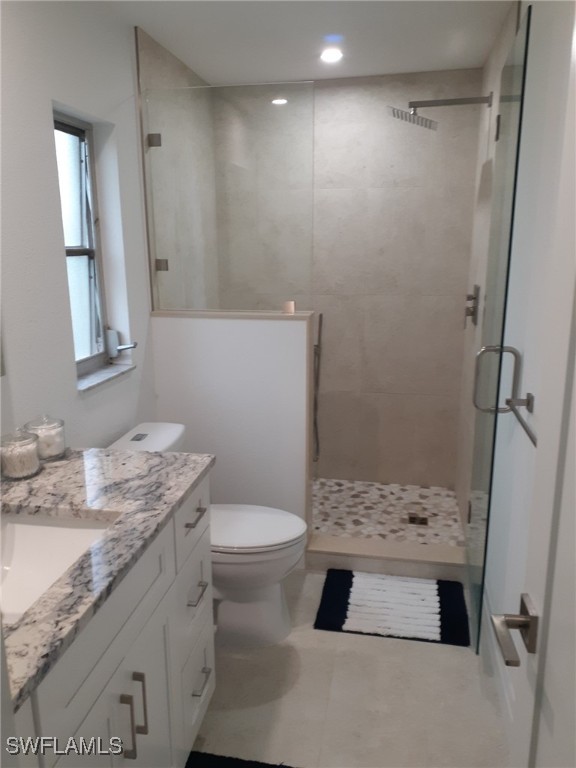 2585 Third Street Matlacha, FL 33993 - Photo 9 of 16 a bathroom with a sink toilet and shower