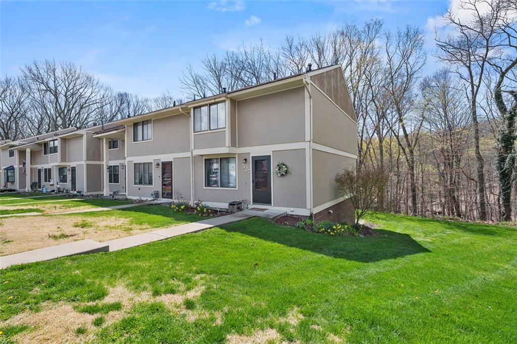 527 Hunters Path Road Bridgeville, PA 15017 - Photo 2 of 33 Enjoy the outdoors with this end-unit townhome! 2 specific parking spaces, but right next to additional guest parking