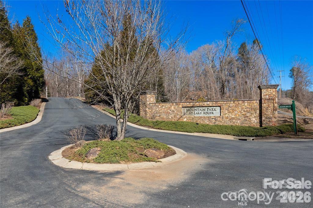 26 Mountain Parkway, Unit 26 Mill Spring, NC 28756 - Photo 7 of 7 a view of a swimming pool with a yard
