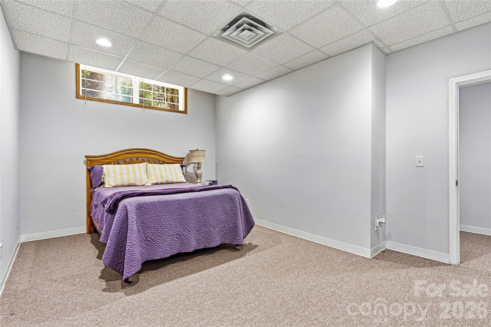 1606 High Ridge Drive Stanley, NC 28164 - Photo 32 of 44 a bedroom with a bed and a window