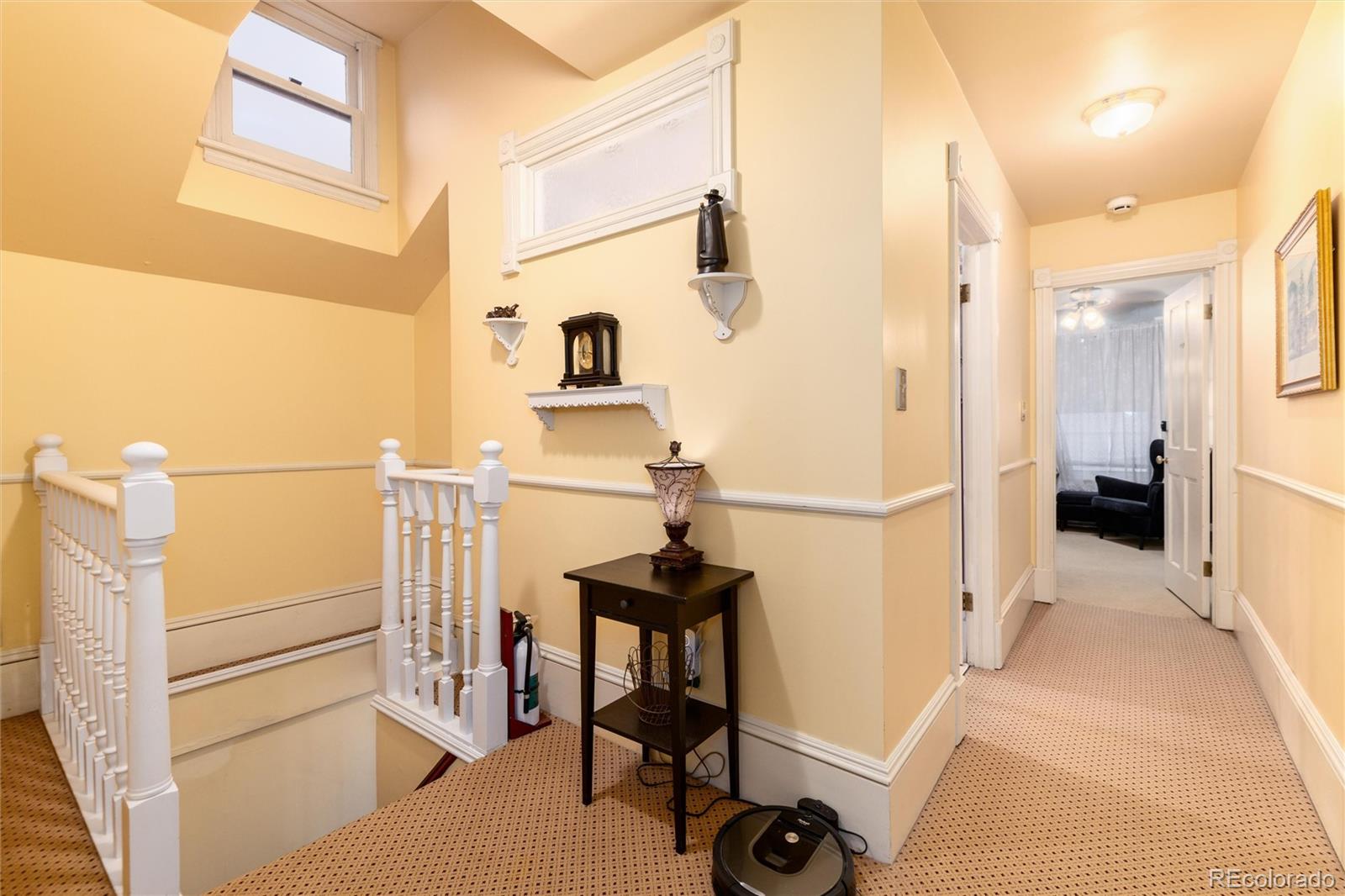 200 Rose Street Georgetown, CO 80444 - Photo 15 of 43 a view of a hallway with a dining table chairs