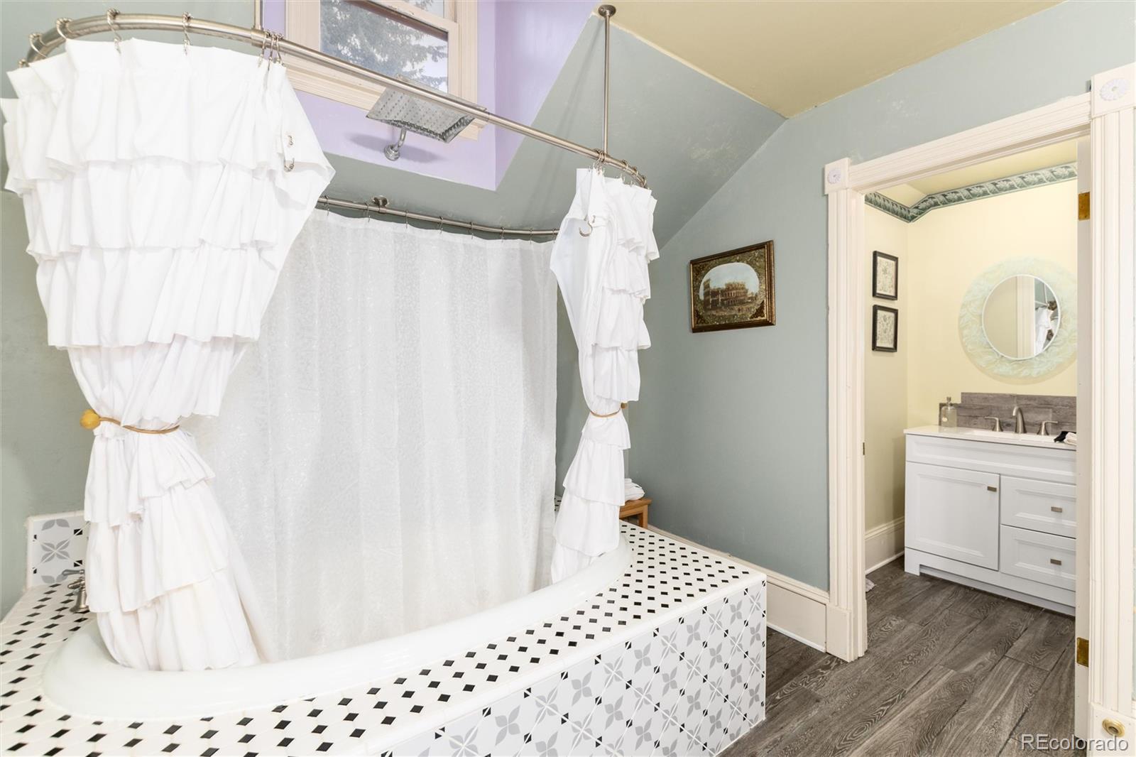 200 Rose Street Georgetown, CO 80444 - Photo 21 of 43 a bathroom with a sink and a mirror