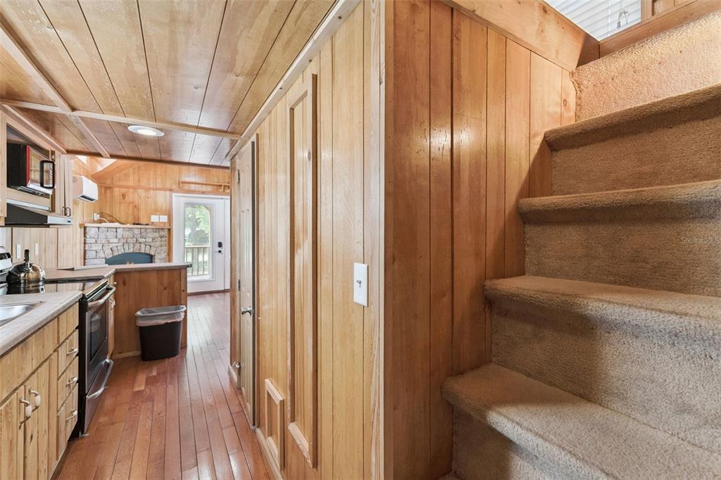 1140 Buckles Road Pierson, FL 32180 - Photo 11 of 39 a view of entryway with wooden floor
