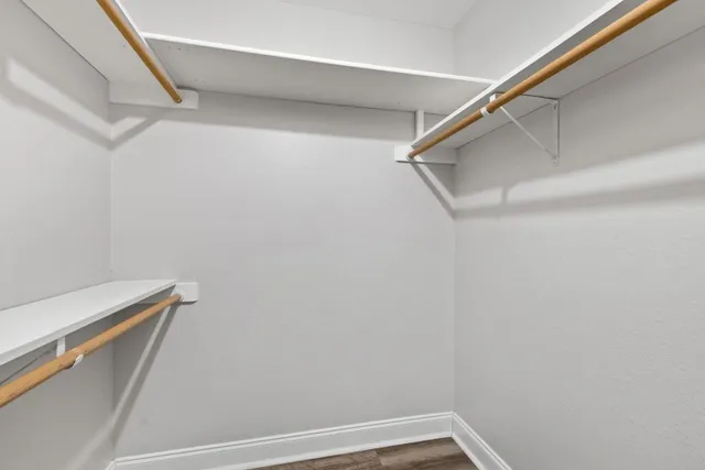 a view of an empty walk in closet