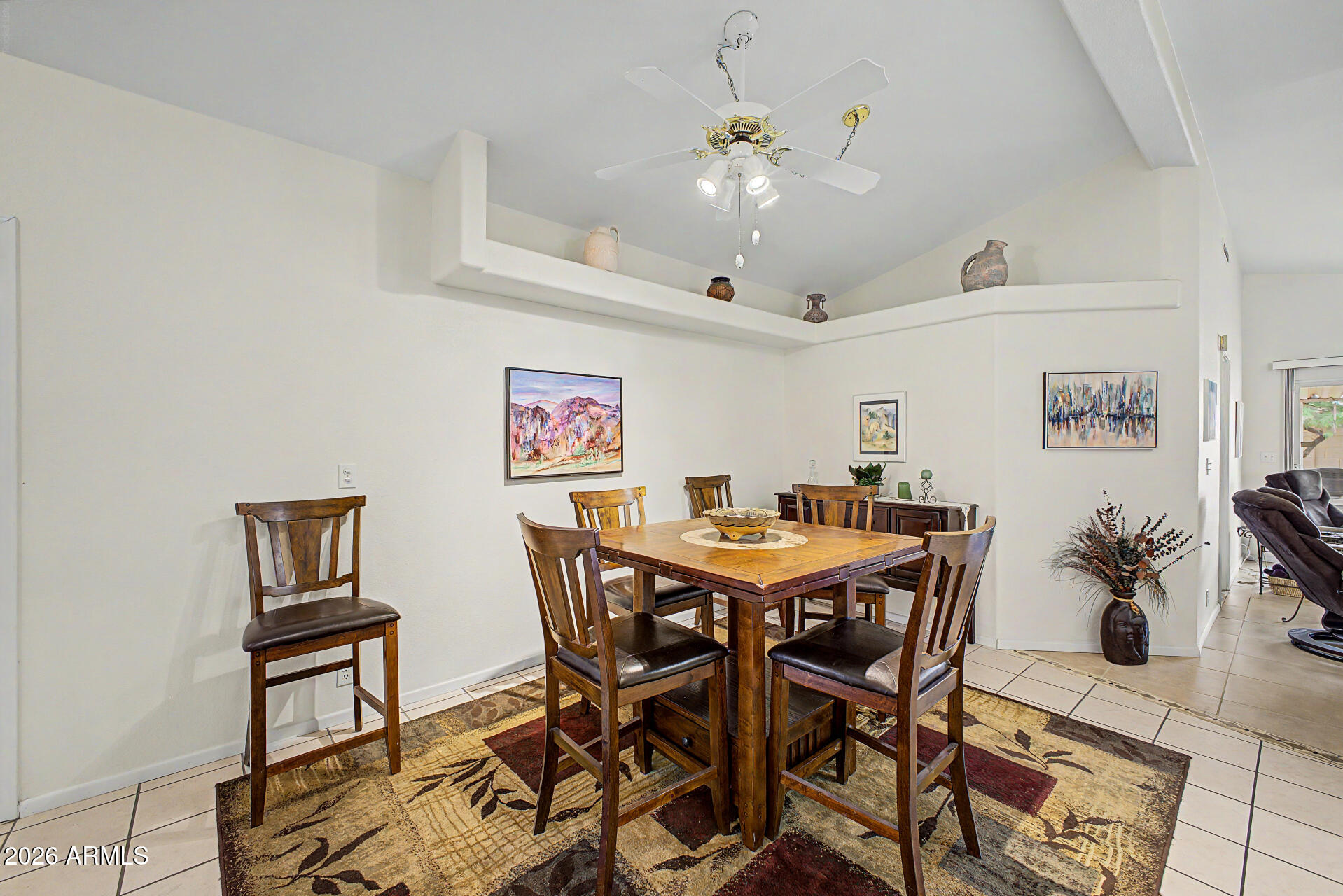 2101 South Meridian Road, Unit 45 Apache Junction, AZ 85120 - Photo 8 of 36 a view of a dining room with furniture and chandelier