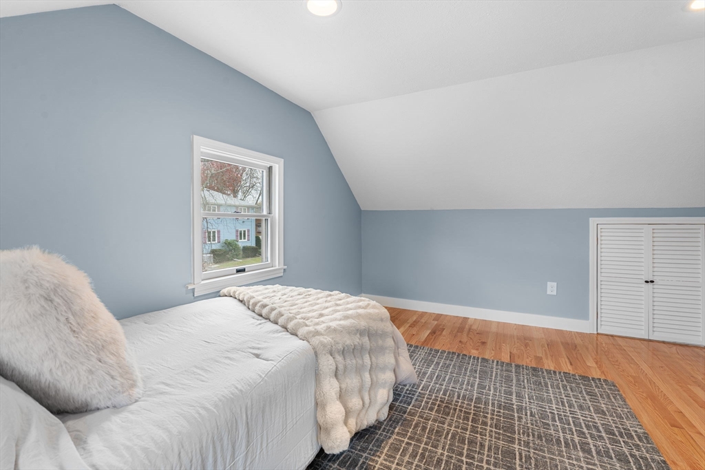23 Yale Road Arlington, MA 02474 - Photo 22 of 37 a bedroom with a bed and a window