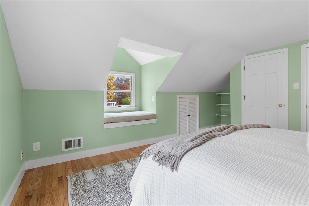 23 Yale Road Arlington, MA 02474 - Photo 27 of 37 a bedroom with a bed and a window