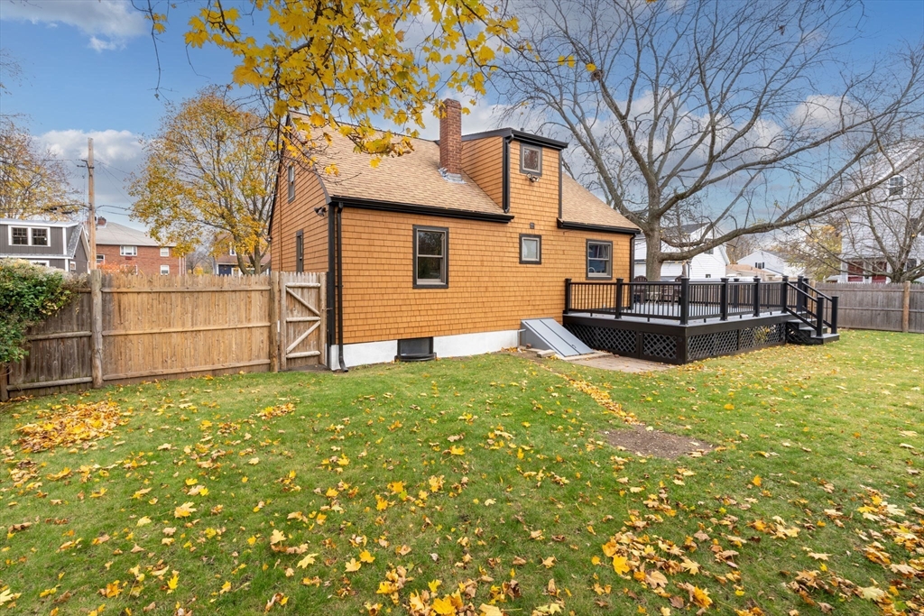 23 Yale Road Arlington, MA 02474 - Photo 3 of 37 a view of a backyard with large tree