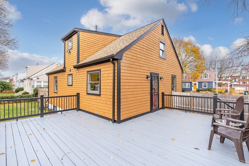 23 Yale Road Arlington, MA 02474 - Photo 32 of 37 a view of a house with a wooden deck