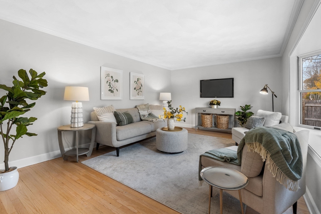 23 Yale Road Arlington, MA 02474 - Photo 6 of 37 a living room with furniture and a flat screen tv