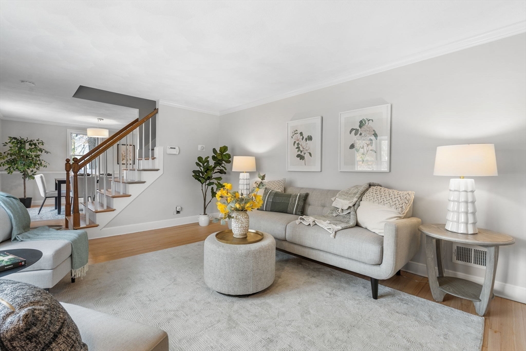 23 Yale Road Arlington, MA 02474 - Photo 7 of 37 a living room with furniture and a wooden floor