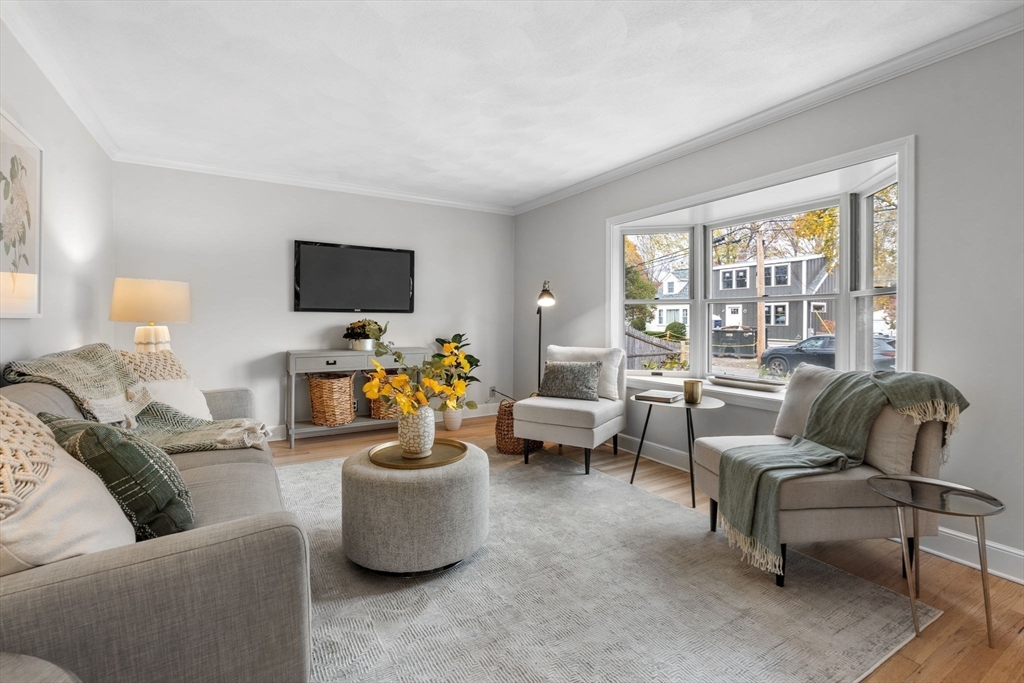 23 Yale Road Arlington, MA 02474 - Photo 8 of 37 a living room with furniture and a flat screen tv