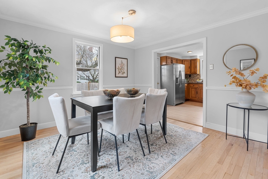23 Yale Road Arlington, MA 02474 - Photo 10 of 37 a view of a dining room with furniture window and wooden floor