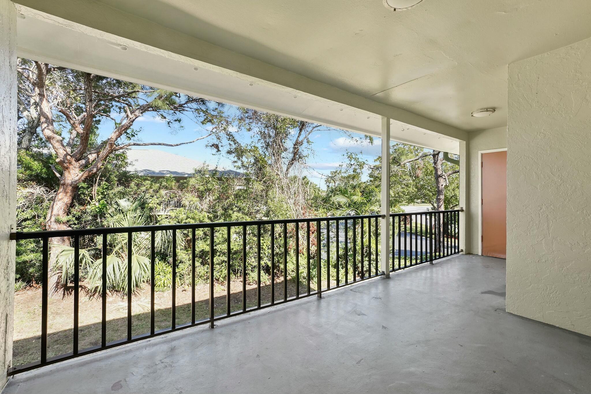 983 Northwest Spruce Ridge Drive, Unit 4 Stuart, FL 34994 - Photo 30 of 56 a view of a balcony
