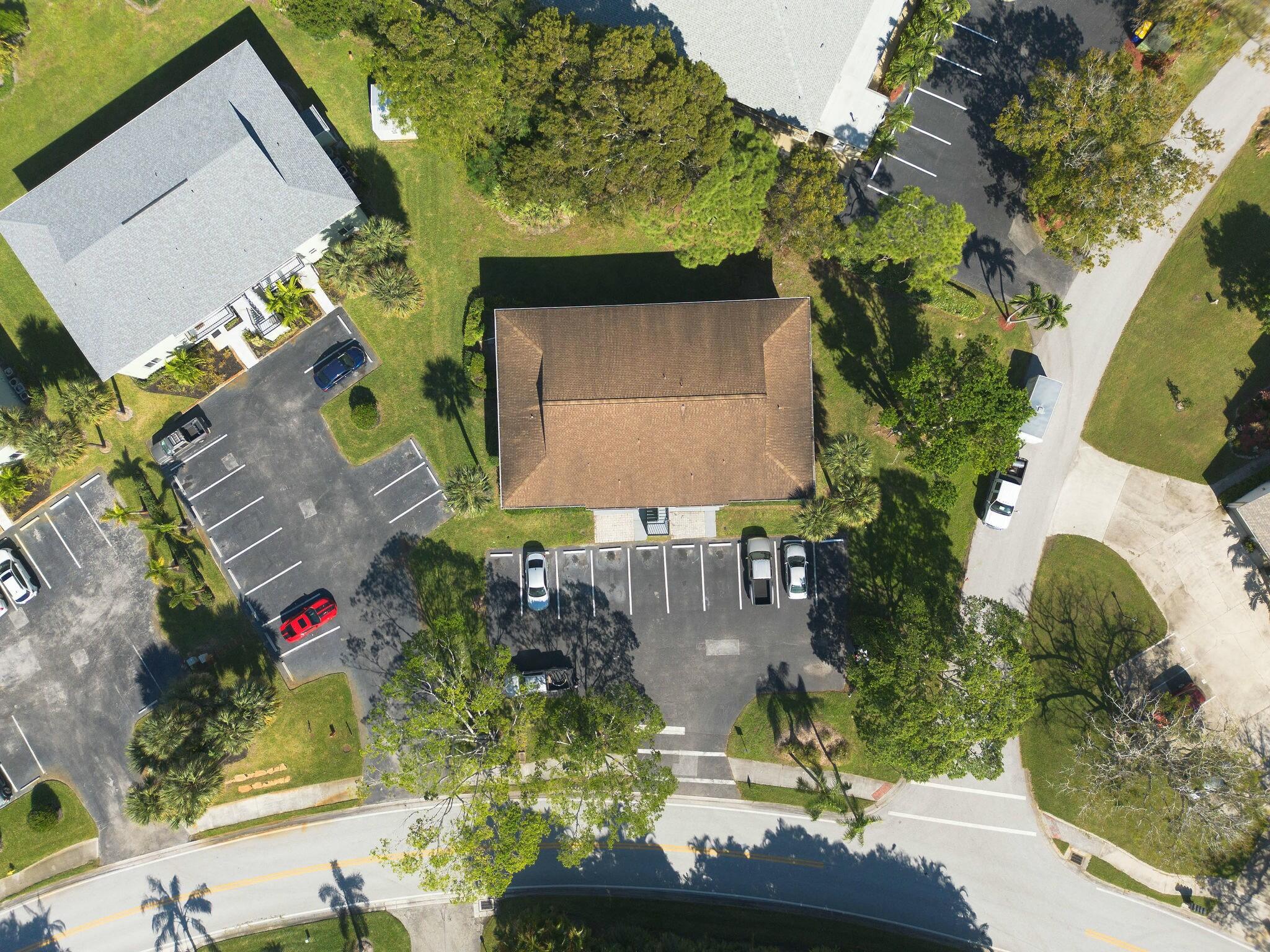983 Northwest Spruce Ridge Drive, Unit 4 Stuart, FL 34994 - Photo 38 of 56 an aerial view of a house