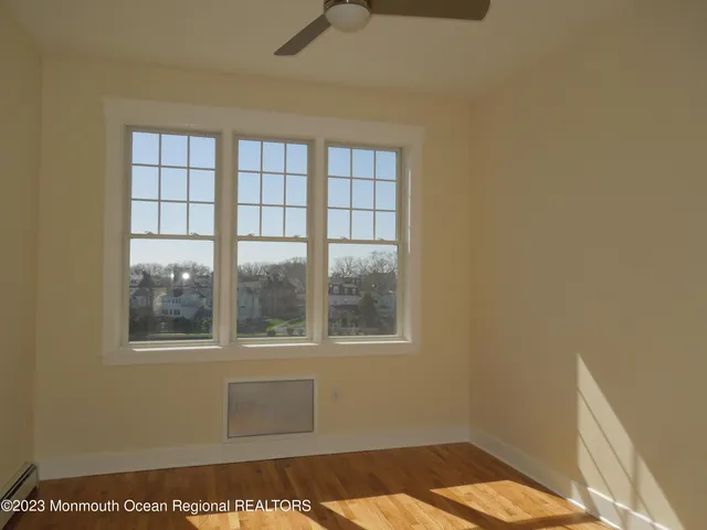a view of a room that has a window in it