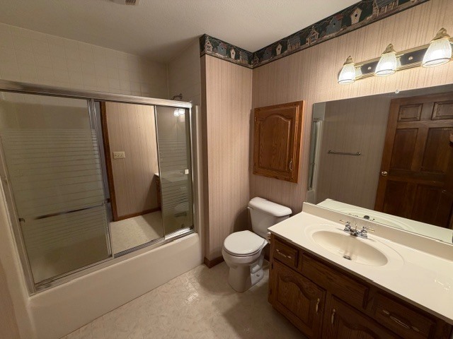 5897 Country Meadow Lane Clinton, IL 61727 - Photo 17 of 59 a bathroom with a double vanity sink toilet and shower